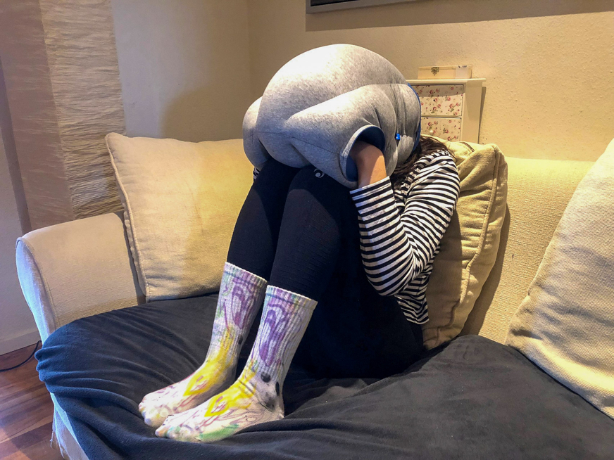 ostrichpillow original napping pillow on seat